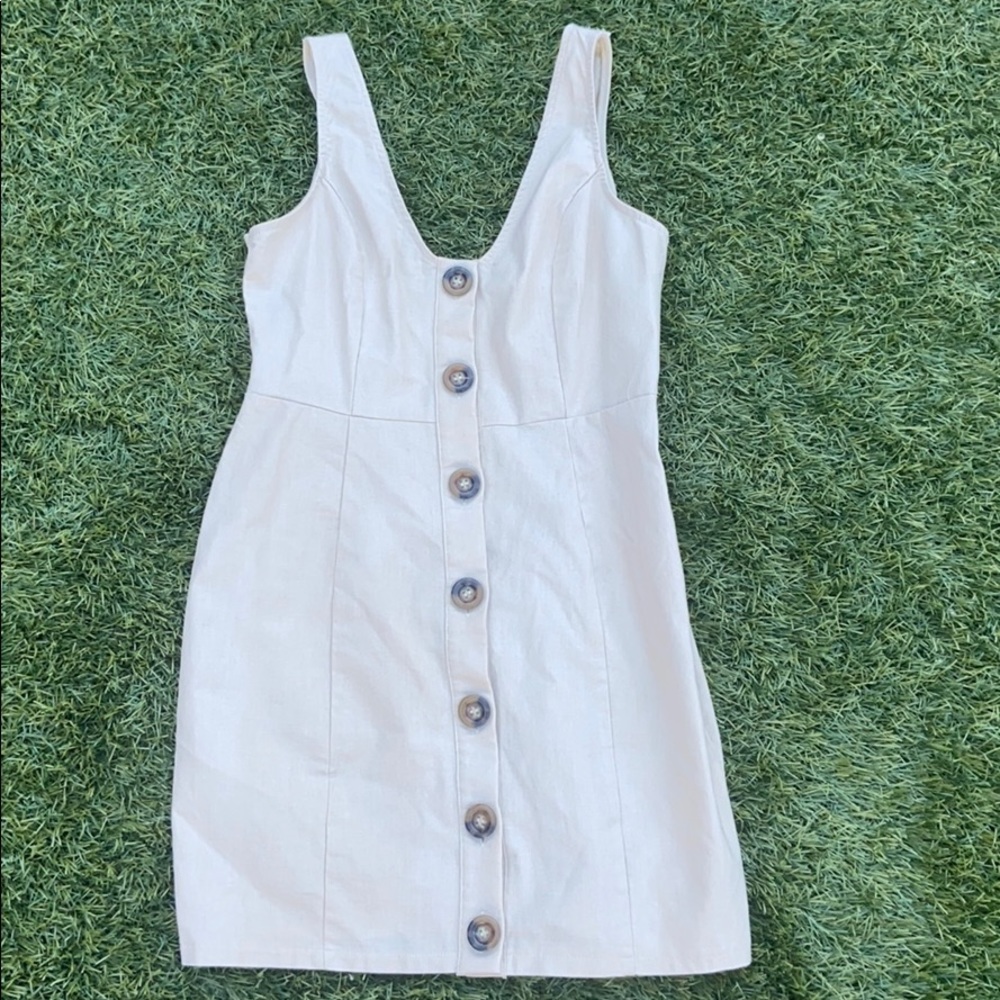 Pretty little thing cream button up dress.